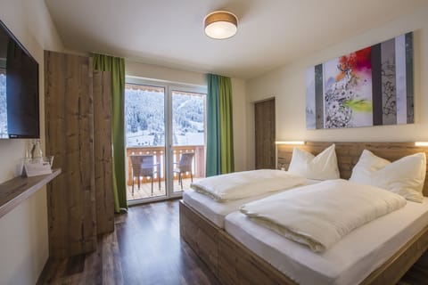 Family Room, 2 Bedrooms, Balcony, Mountain View | 5 bedrooms, hypo-allergenic bedding, blackout drapes, free WiFi