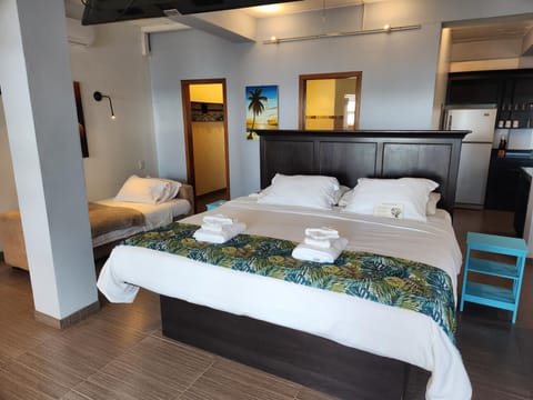 Executive Suite, Patio, Beachside | In-room safe, individually decorated, individually furnished