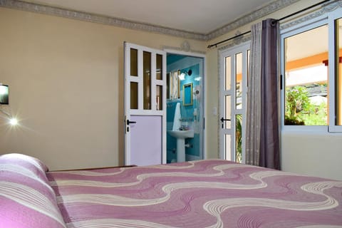 Double Room | Minibar, in-room safe, iron/ironing board, bed sheets