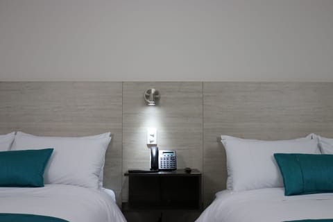 Deluxe Twin Room, Multiple Beds, City View | Premium bedding, minibar, in-room safe, desk