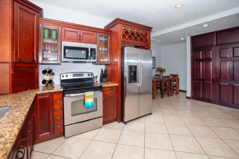 Condo, 3 Bedrooms | Private kitchen | Fridge, coffee/tea maker, toaster, dining tables