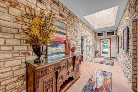 Stone entry way - splits the house into 2 sides