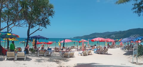 On the beach, beach towels, water skiing