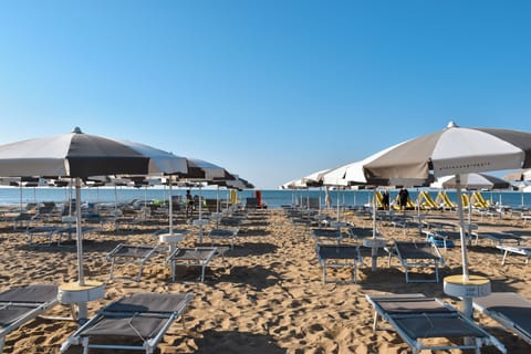 On the beach, beach umbrellas, beach volleyball