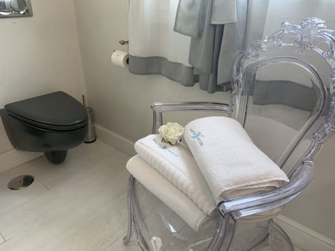 Suite, Balcony, Pool View | Bathroom | Shower, hydromassage showerhead, free toiletries, hair dryer