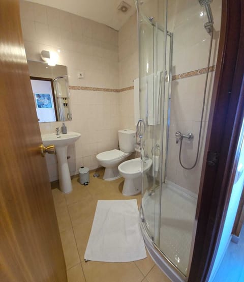 Standard Double Room, Private Bathroom | Bathroom | Shower, free toiletries, towels