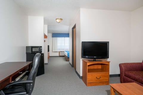 Suite, 1 King Bed | Select Comfort beds, in-room safe, desk, iron/ironing board