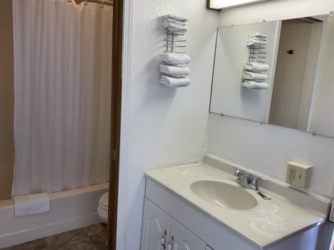 Standard Room, 2 Queen Beds | Bathroom | Combined shower/tub, free toiletries, towels