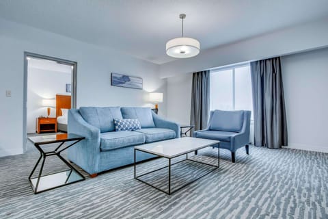 Executive Suite, 1 King Bed | Living area | 42-inch flat-screen TV with premium channels, TV