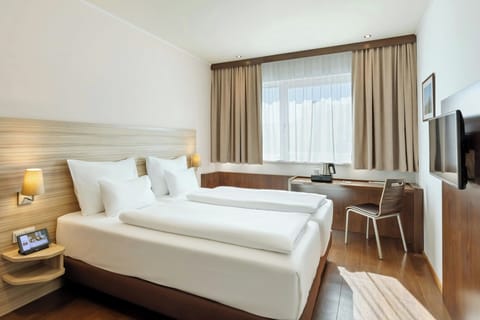 Standard Room, 2 Twin Beds, City View (City View) | Minibar, in-room safe, desk, blackout drapes