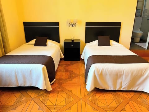 Deluxe Twin Room, 2 Twin Beds | In-room safe, free WiFi, bed sheets