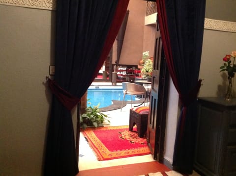 Standard Suite, Pool View (Suite MD) | Individually decorated, blackout drapes, iron/ironing board, free WiFi