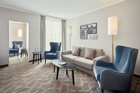 Suite, 1 Bedroom | Living room | 32-inch LCD TV with satellite channels, TV, pay movies