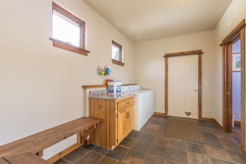 Mud room and door out to garage.