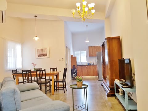 Deluxe Apartment, 3 Bedrooms (Orem) | Living room | Flat-screen TV