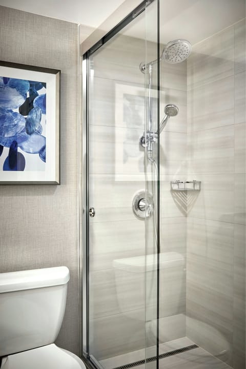 Combined shower/tub, designer toiletries, hair dryer, bathrobes