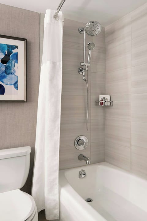 Combined shower/tub, designer toiletries, hair dryer, bathrobes