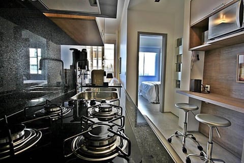 Apartment (U022) | Private kitchen | Fridge, microwave, stovetop, cookware/dishes/utensils