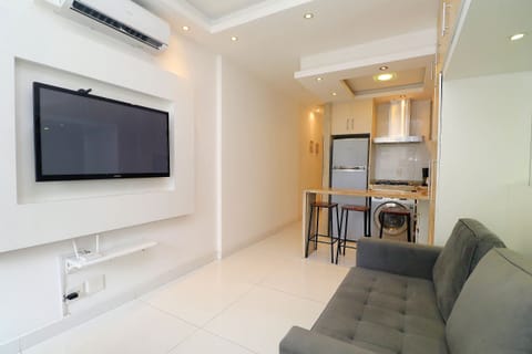 Apartment (C033) | Living area | Flat-screen TV