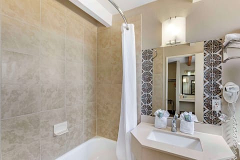 Suite, 2 Queen Beds, Non Smoking, Refrigerator & Microwave | Bathroom | Combined shower/tub, free toiletries, hair dryer, towels