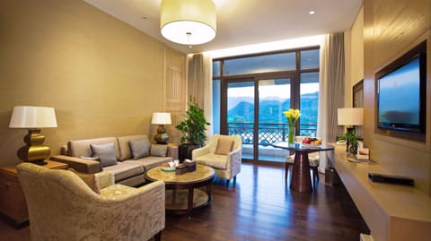 Deluxe Suite, Lake View | Living area | LCD TV