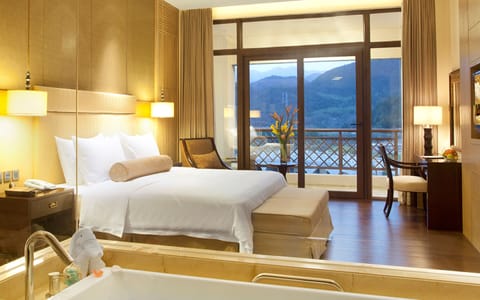Deluxe Suite, Lake View | Premium bedding, minibar, in-room safe, desk