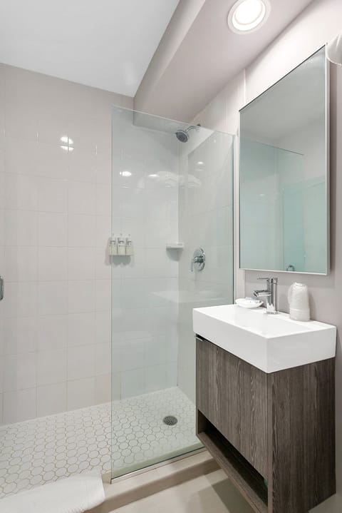 Standard Room, 1 King Bed, Oceanfront | Bathroom | Shower, eco-friendly toiletries, hair dryer, towels