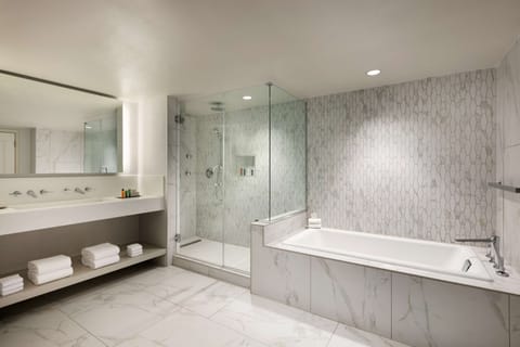 Suite, 1 King Bed | Bathroom | Combined shower/tub, designer toiletries, hair dryer, towels