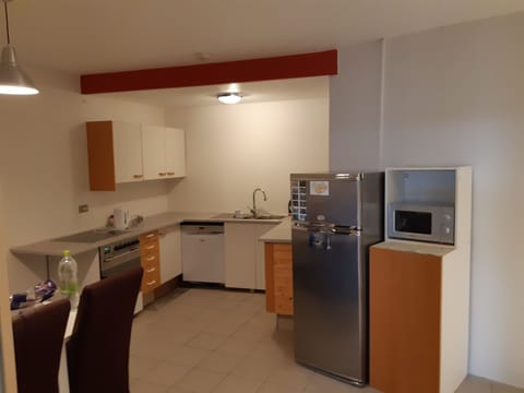 Comfort Apartment, 3 Bedrooms | Private kitchen | Full-size fridge, microwave, stovetop, toaster