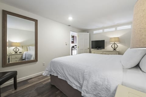 Suite, 1 Bedroom, Kitchenette, 1 King Bed OR 2 Queen Beds (Stairs Required) | Bathroom | Free toiletries, hair dryer, towels
