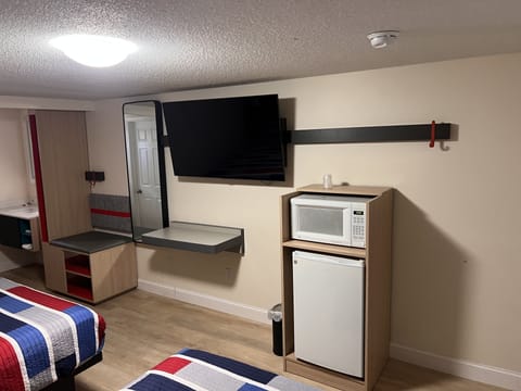 Premium Double Room, 2 Queen Beds, Non Smoking | Living area | TV