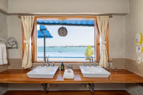 Deluxe Suite, Balcony, Ocean View | Bathroom | Shower, designer toiletries, hair dryer, bathrobes