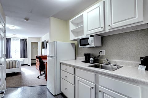 Room, 1 King Bed, Accessible, Non Smoking | Private kitchen | Full-size fridge, microwave, coffee/tea maker