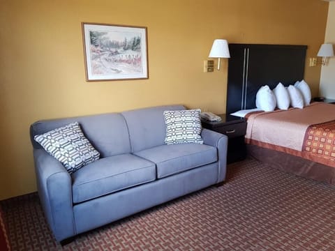 Suite, 1 King Bed with Sofa bed, Non Smoking | Desk, iron/ironing board, rollaway beds, free WiFi