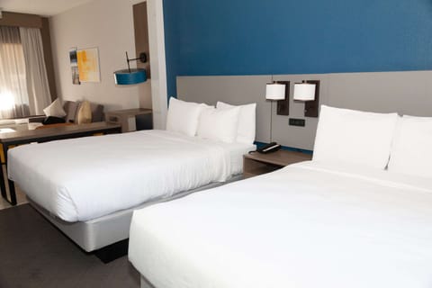 Suite, Multiple Beds, Non Smoking | Premium bedding, desk, blackout drapes, iron/ironing board