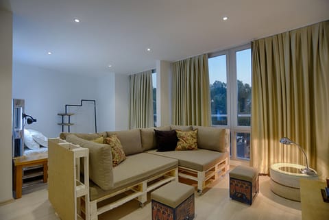 Deluxe Studio Suite, Non Smoking, Sea View | Living area | 40-inch flat-screen TV with satellite channels, LCD TV