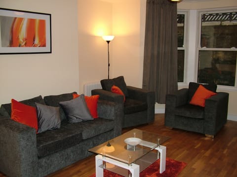 Business Apartment, 1 Bedroom | Living area | 32-inch flat-screen TV with digital channels, TV