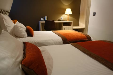 Double or Twin Room | Minibar, desk, free WiFi, bed sheets