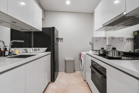 Family Apartment, 2 Bedrooms, Tower | Private kitchen | Full-size fridge, microwave, oven, stovetop