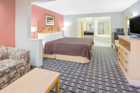 Upgraded, Suite, 1 King Bed, Non Smoking | Desk, iron/ironing board, free cribs/infant beds, rollaway beds