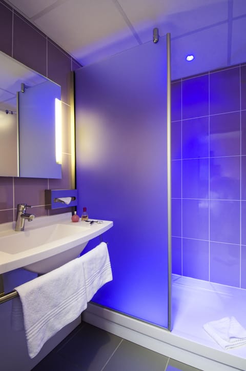 Standard Suite, Multiple Beds | Bathroom | Shower, eco-friendly toiletries, hair dryer, towels