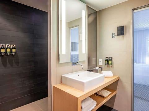 Premium bedding, down comforters, pillowtop beds, free minibar