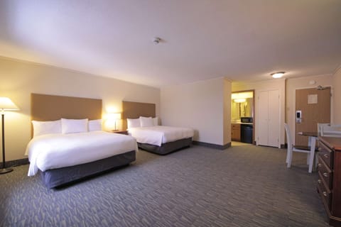 Suite, Multiple Beds, Non Smoking, Kitchenette | Desk, blackout drapes, iron/ironing board, free WiFi
