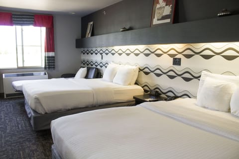 Signature Room | Down comforters, in-room safe, individually decorated