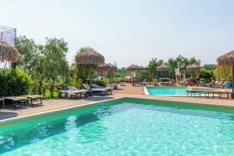 Seasonal outdoor pool, pool umbrellas, sun loungers