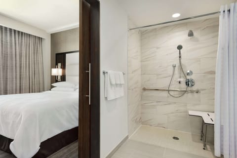 Suite, 1 King Bed, Accessible (Mobility&Hearing, Roll-in Shwr, 2 Rm) | Bathroom | Deep soaking tub, free toiletries, towels