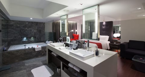 Suite, 1 King Bed (Spa Suite) | Minibar, in-room safe, desk, blackout drapes