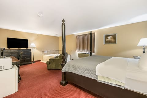 Suite, 1 King Bed, Non Smoking, Jetted Tub | Premium bedding, desk, blackout drapes, iron/ironing board