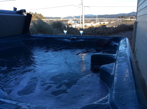 6 person Hot tub. On deck (off of blue bedroom ) with view of bridge!