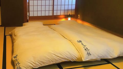 Japanese Style Room with Private Bathroom, Non Smoking | In-room safe, desk, free WiFi, bed sheets